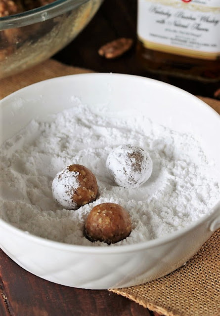 Rolling Kentucky Bourbon Balls in Powdered Sugar Image