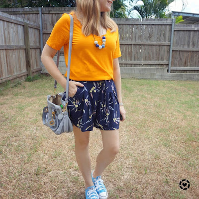 awayfromtheblue Instagram | marigold orange tee with kmart navy printed culottes chloe paraty bag