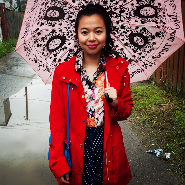 pink umbrella red raincoat floral blouse polka dot skirt