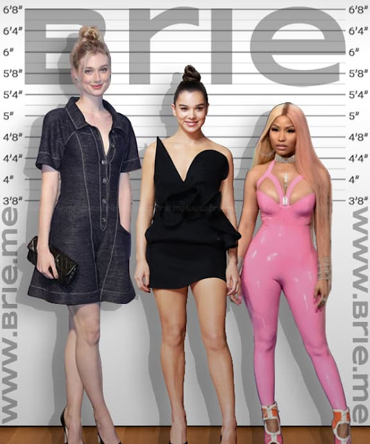 Hailee Steinfeld standing with Elizabeth Debicki andNicki Minaj