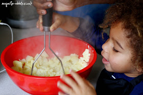 Mashing potatoes for cottage pie from anyonita-nibbles.co.uk