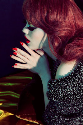 red glossy manicure, model with long eyelashes, redhead supermodel