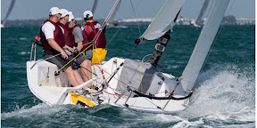 J/70 one-design speedster- sailing team going upwind