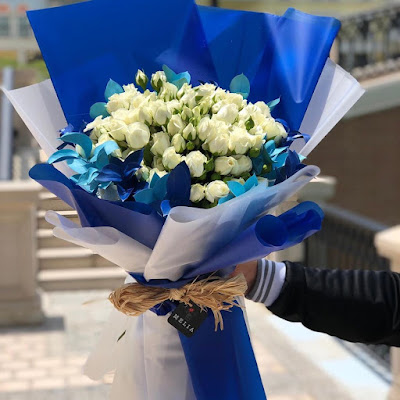 blue wrap bouquet with twine - wedding bouquet ideas - K'Mich Weddings - day-of-service planners in Philadelphia PA