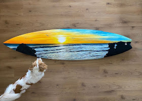 03-Dog-enjoying-the-view-Surfboard-Paintings-Claire-Marie-www-designstack-co