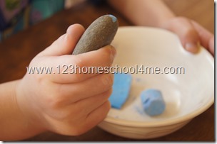 crushing chalk to make egg based tempera paint