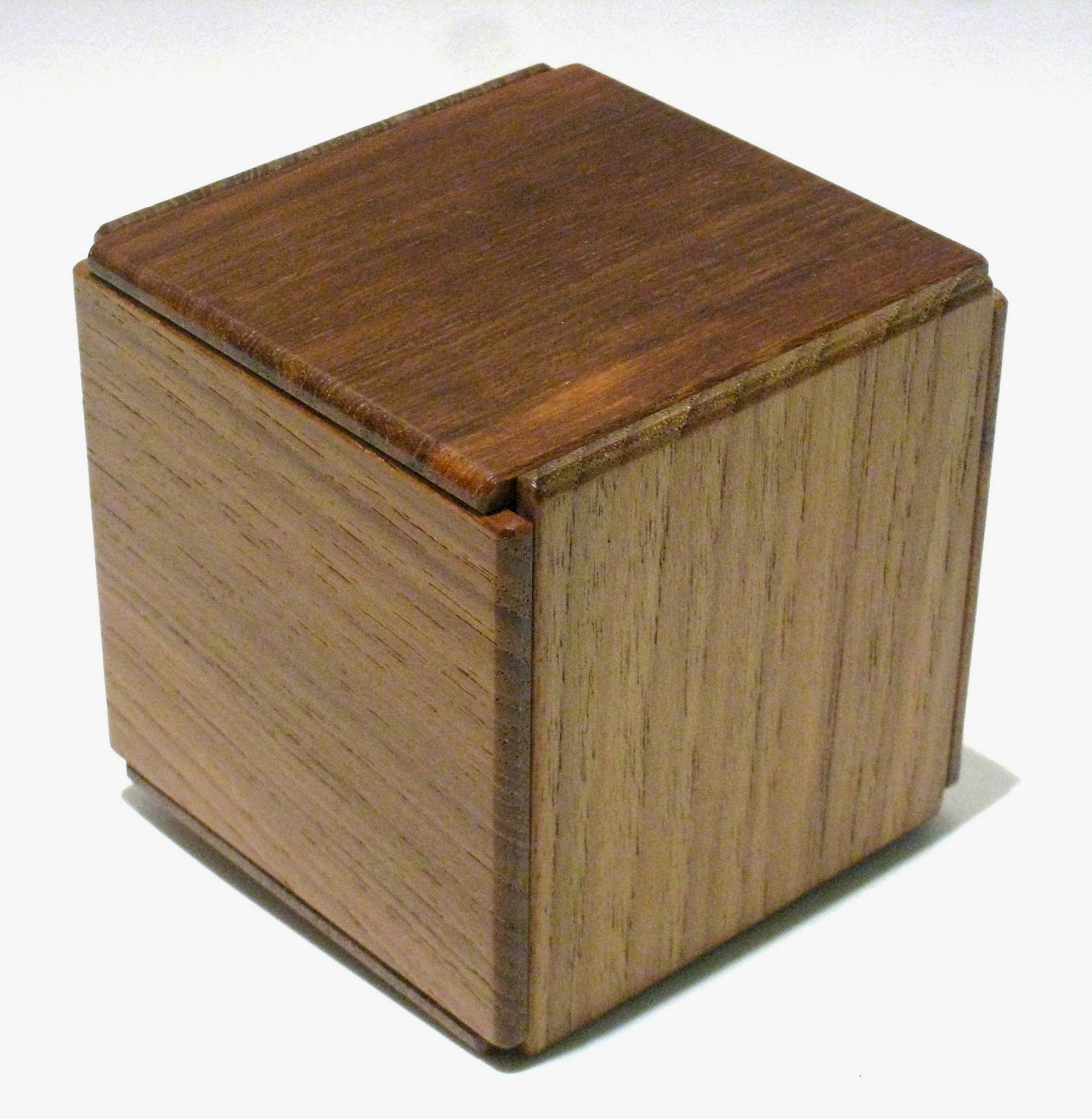 This puzzle box was designed and made by Hiroshi Iwahara from the 