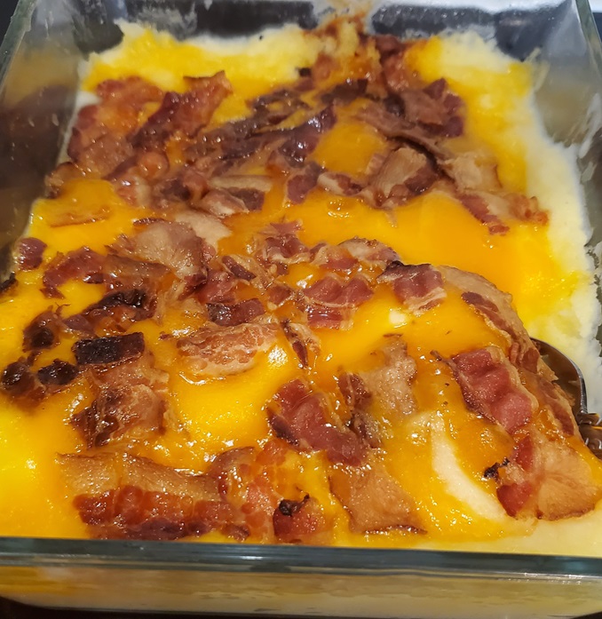 cheese topped mashed potatoes and bacon