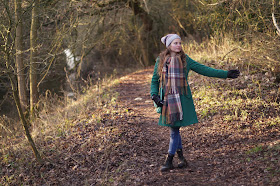 wearing a hat and scarf in winter