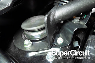 SUPERCIRCUIT Front Strut Bar in MATTE BLACK heavy duty coating installed to the Perodua Bezza.