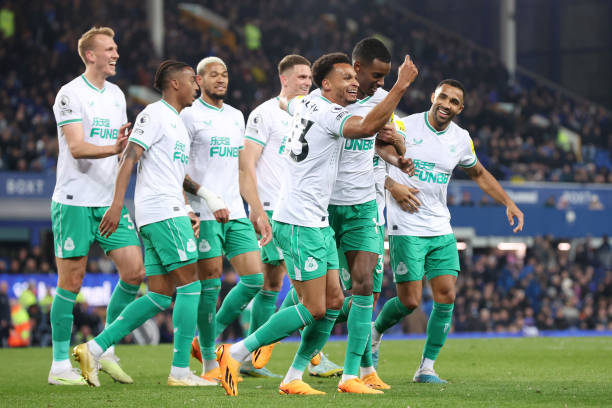 Jacob Murphy of Newcastle United celebrates with teammates after scoring the team's fourth goal