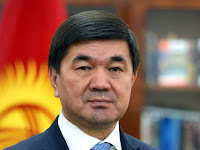 Prime Minister quits as protesters take control in Kyrgyzstan.