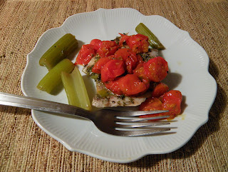 Plate of Celery and Fish topped with Roasted Tomatoes