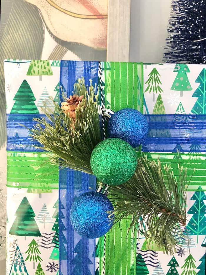 colorful blue and green wrapped Christmas gift