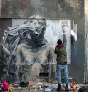 Borondo finished a beautiful graffiti art piece on the streets of Paris, . (borondo paris france )