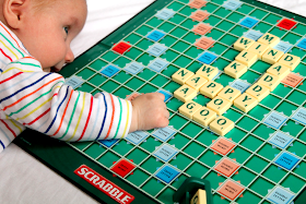 baby playing scrabble