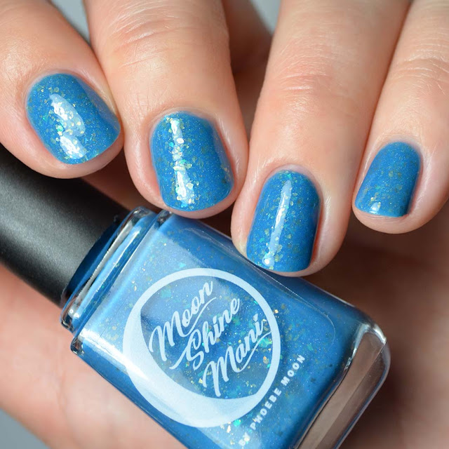 blue nail polish with flakies