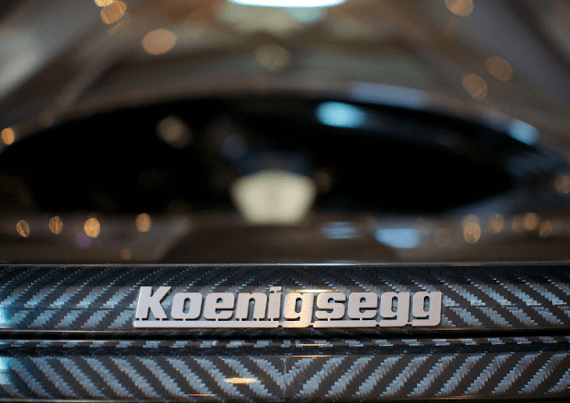 Koenigsegg CCXR Edition close up to badge and carbon fibre