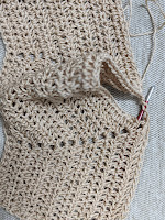 back to front attached, leaving armhole opening