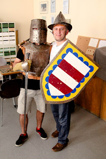 Photo of Simone and Sorin with medieval arms