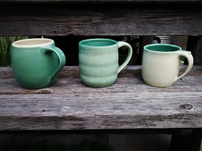 Image of three beautiful handmade ceramic mugs for summer