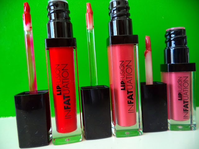   FusionBeauty LipFusion Infatuation Liquid Shine Multi-Action Lip Fattener in Screen Siren (L), Full Frontal (M), and Pucker Up (R)