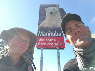 Sonya Richmond and Sean Morton at Manitoba border.