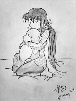 Lonely girl hugging her teddy