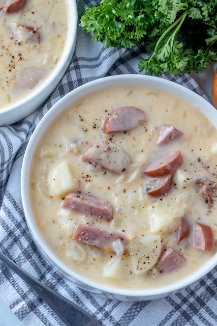 Delicious and easy 30 minute meal! Perfect for weeknight lunch or dinner and the sauerkraut adds a surprising touch of flavor in this German inspired soup. The kielbasa and potatoes make it hearty and comforting!