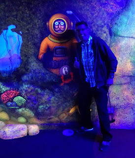 Meeting Mr Mulligan under the sea in the blacklit indoor minigolf course in Stevenage last year