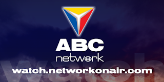 ABC TV logo - a red blue and yellow triangle pointing downward on a blue background