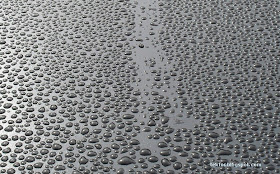 water drops on a steel door.
