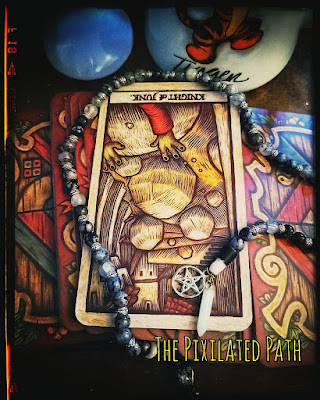 Knight of Junk card from the Labyrinth tarot, in the reversed position.
