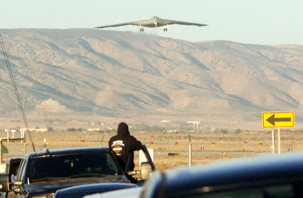 The U.S. Air Force's B-21 Raider stealth bomber takes to the sky for the very first time above the Mojave Desert in California...on November 10, 2023.