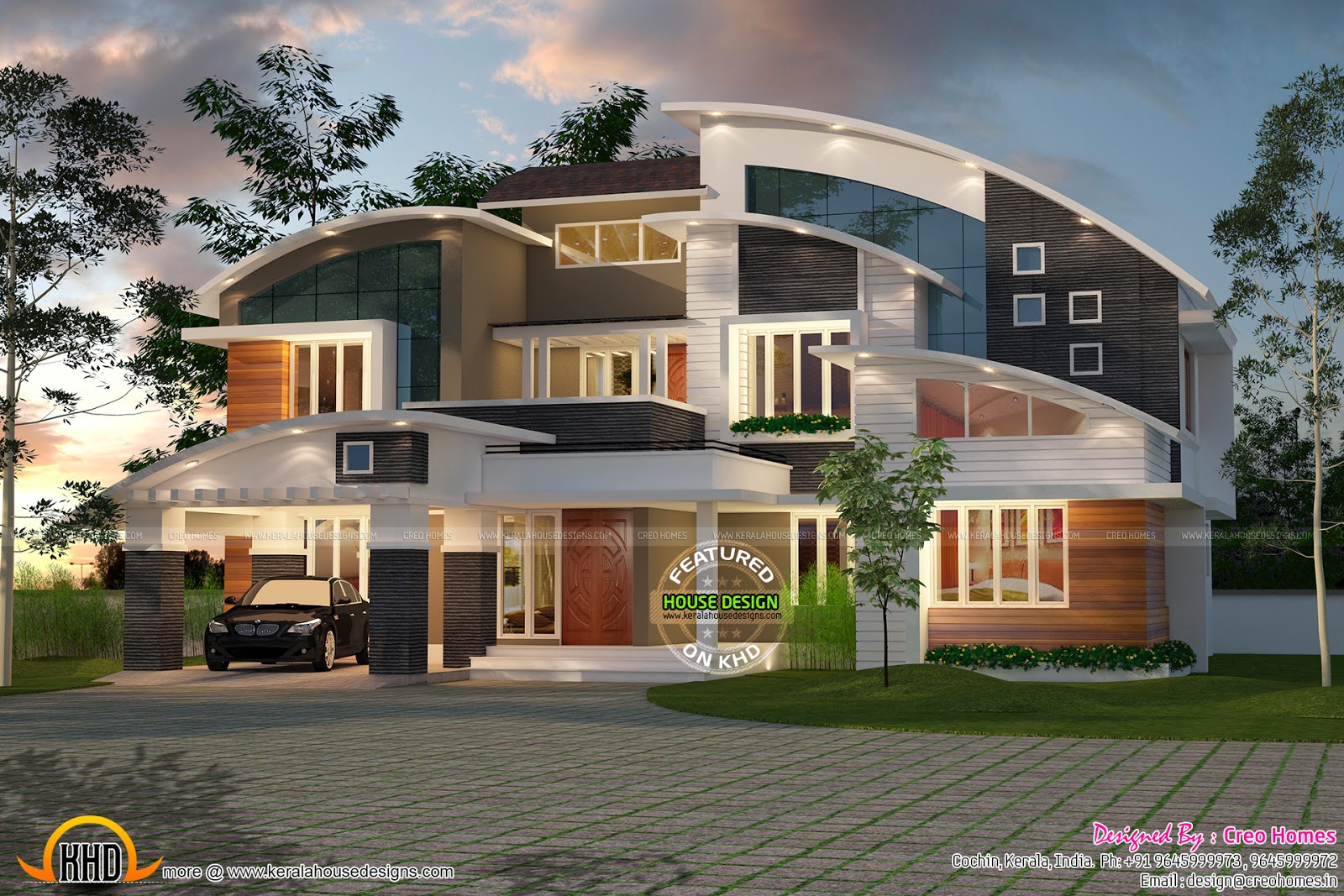 Contemporary curved roof house Kerala home design and 