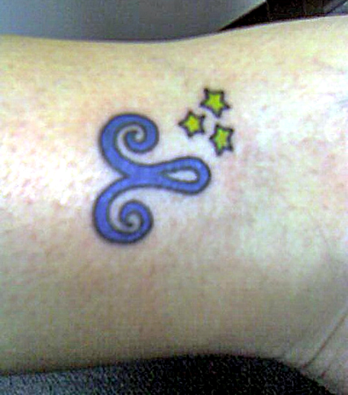 Here is a photo of the tattoo,