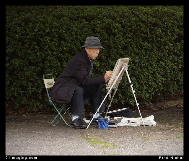 Painter in East garden imperial palace grounds, tokyo, japan, man with easel.