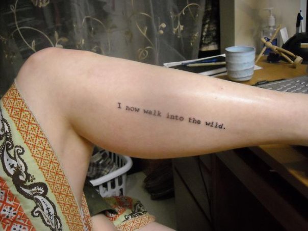 In her own words As for the tattoo on my leg it's a quote from the book 