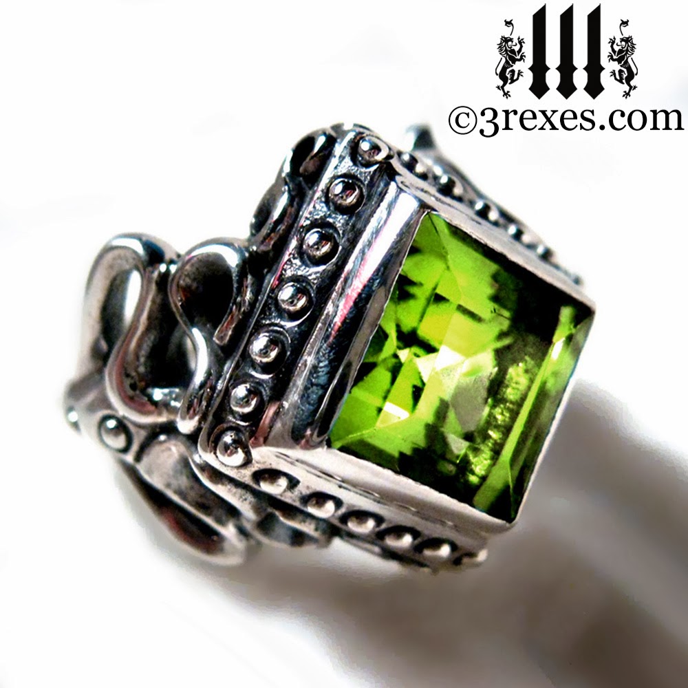 raven love silver gothic wedding ring with green peridot