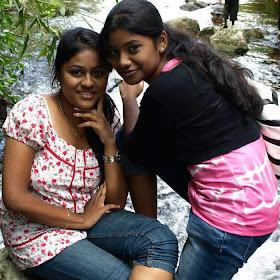 Girls enjoying their vacation in water falls in Tamil Nadu courtallam. 