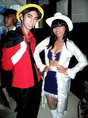 Xhell and TJ cosplaying as Luffy and Nico Robin