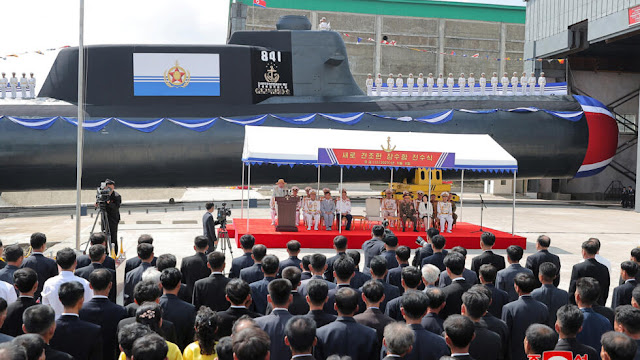 North Korean leader Kim Jong Un is present at what state media have announced as a launch event for a fresh tactical nuclear attack submarine in North Korea. This photograph was made available by North Korea's Korean Central News Agency (KCNA) on September 8, 2023. KCNA.