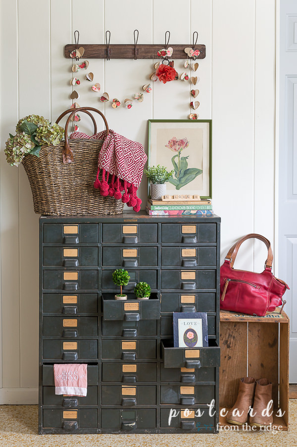 vintage metal drawer cabinet with various valentine's day decor