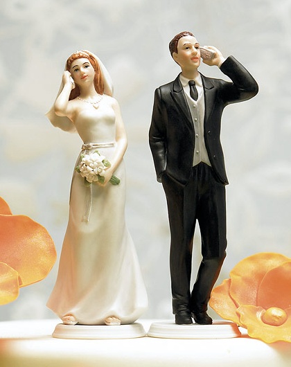 There are many styles of funny wedding cake toppers