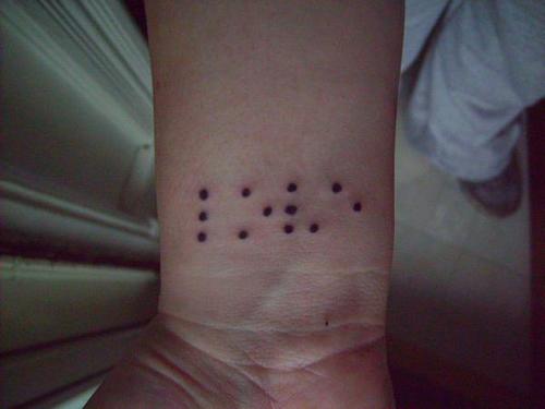 Wednesday Randoms Wrist Tattoos The braille tattoo says'Love' Still no
