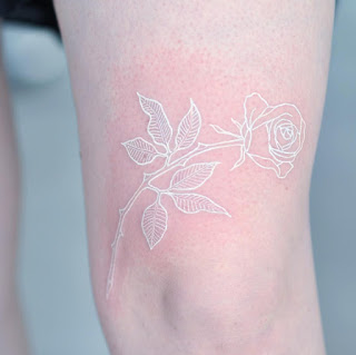 White ink tattoo