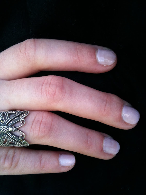 wedding ring with pink nails