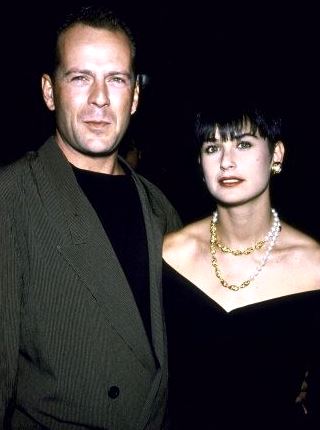 Foto de Demi Moore con flequillo con Bruce Willis