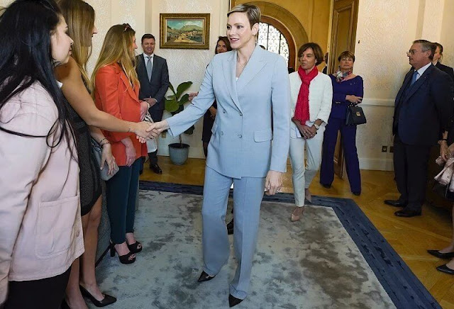 Princess Charlene wore dusty blue double breasted jacket and Carl wool double face pants by Akris. Princess Gabriella