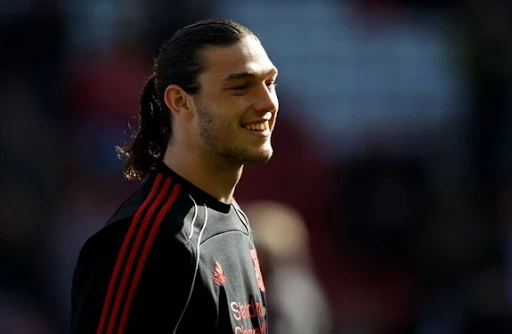 Andy Carroll has been hailed as a young Didier Drogba by his Liverpool team-mate Joe Cole